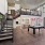 a stairwell and pool tables