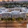 Aerial view of Arts District Apartments with downtown Phoenix skyline in the background 
