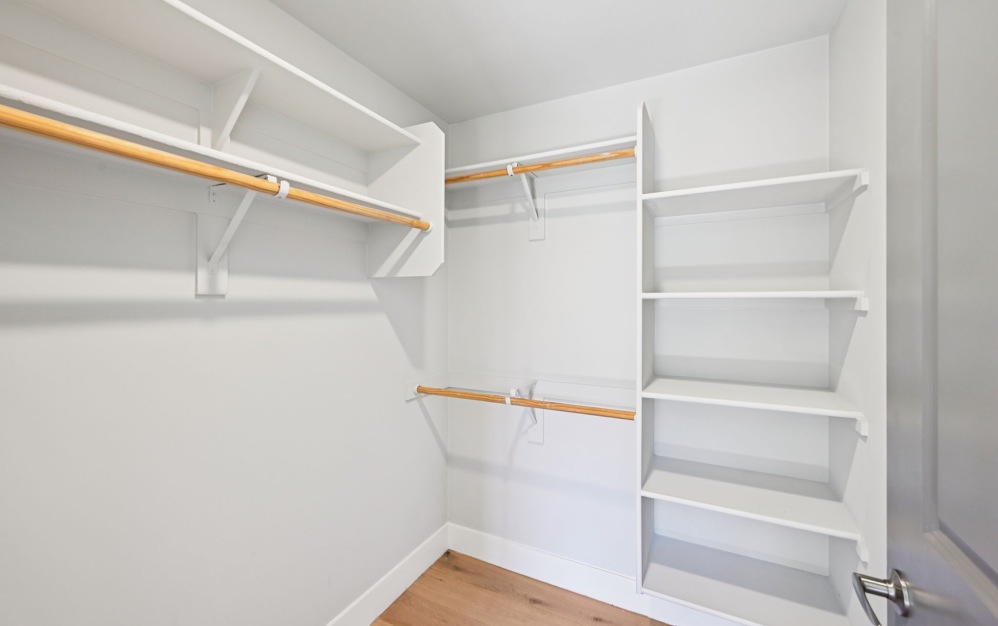 Ample storage space inside closets in apartment homes at Arts District 