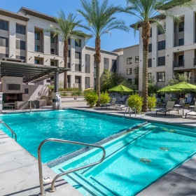 Resort-style pool at Arts District Apartments Community pool and pool deck at Arts District Apartments in Phoenix, AZ