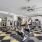Resistance machines and cardio equipment in Art District Apartments' 24-hour fitness center