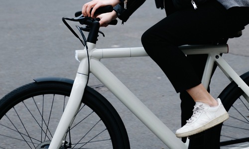 lifestyle image of a person on a bicycle